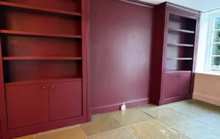 Room divider with secret door to under stairs storage